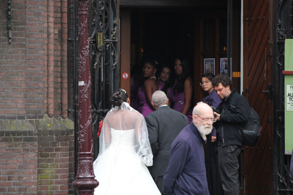 Wedding in Amsterdam: The man in the blue sweater is in every photo!