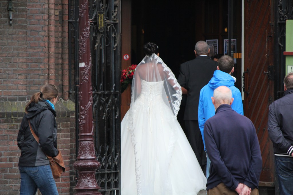 Wedding in Amsterdam: The man in the blue sweater is in every photo!
